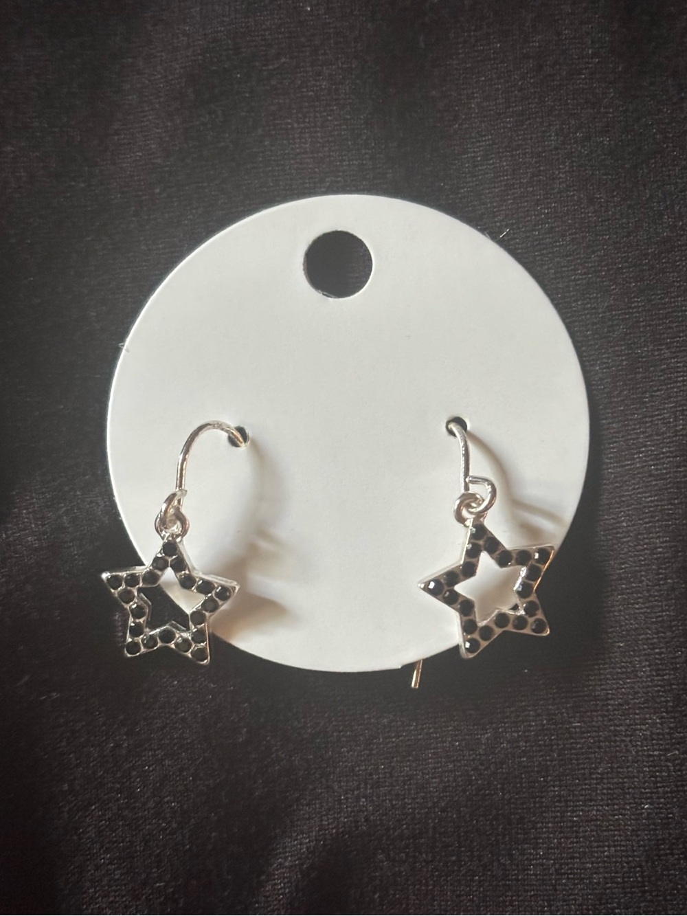 dangly studded star earrings